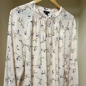 Blush colored with purple flowers Ann Taylor blouse. Size Large.